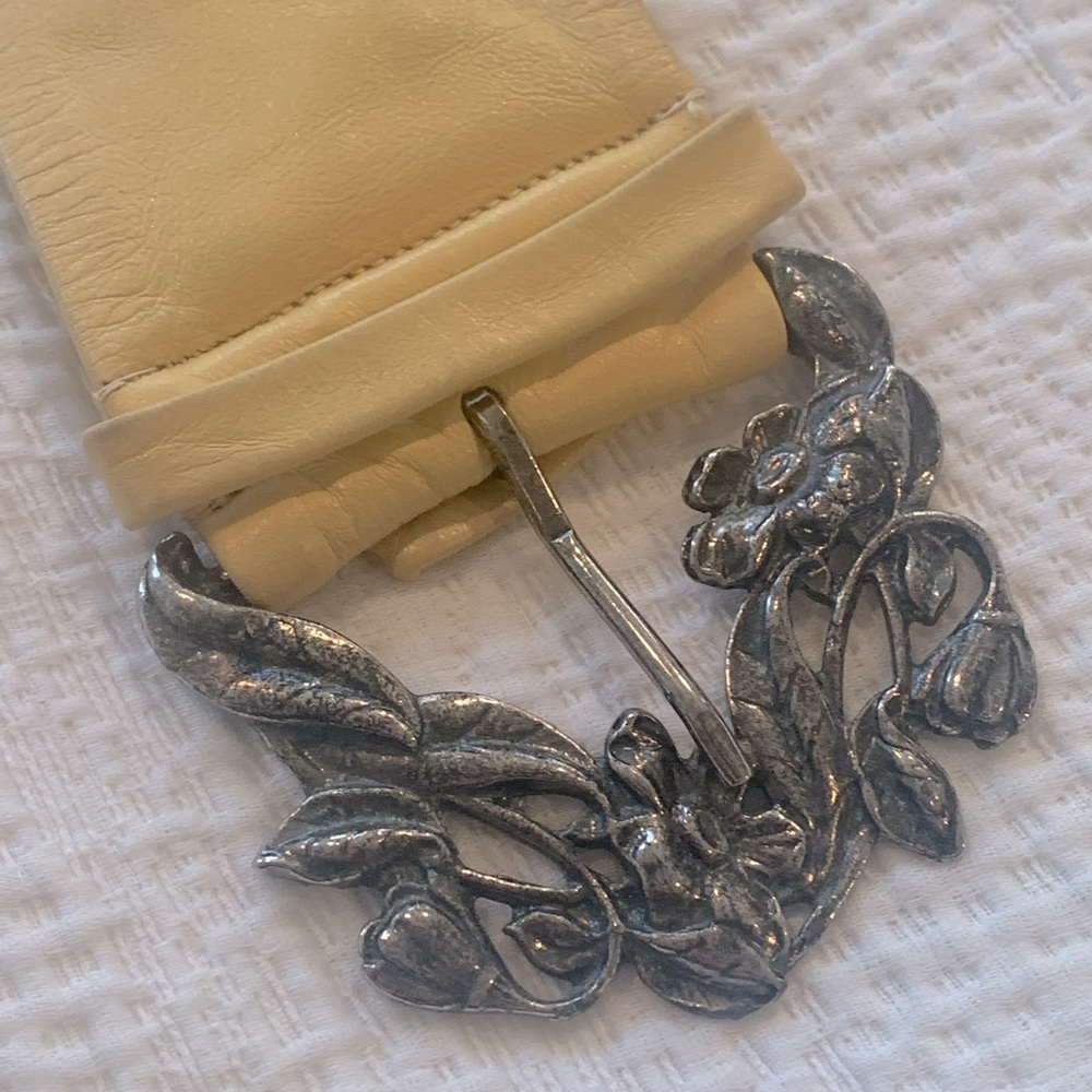 Vintage light yellow leather belt with beautiful floral silver buckle